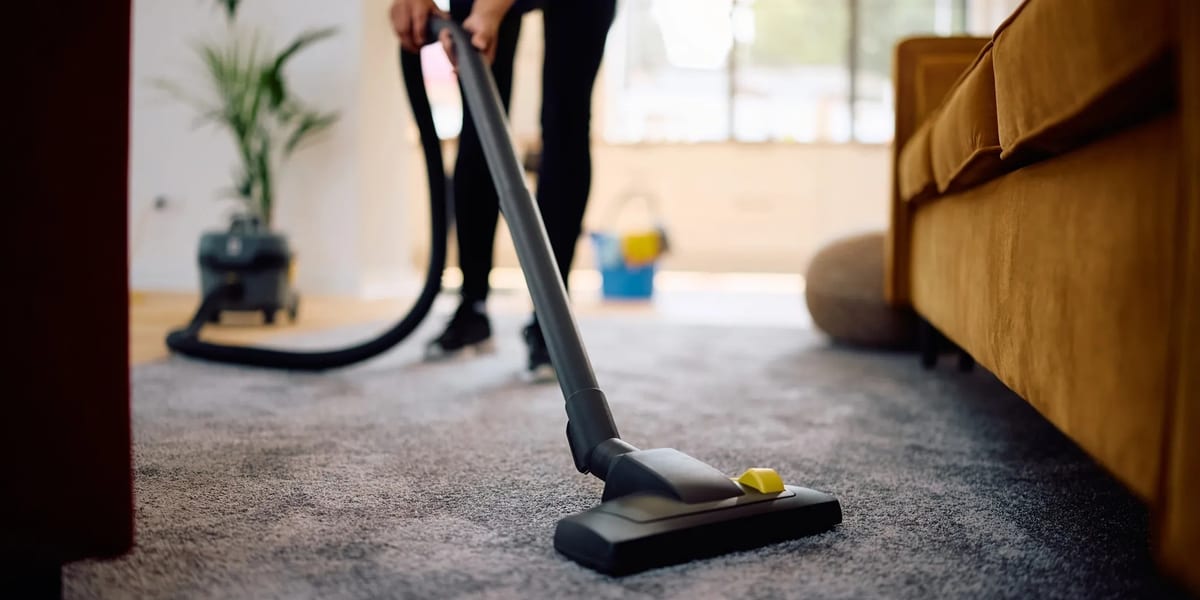 A professional noting details during a home visit